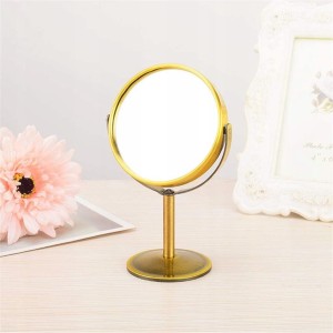 Lusterko kosmetyczne złote na nóżce stojące z powiększeniem dwustronne