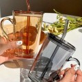 Szklany kubek ze słomką na lemoniadę sok wodę 450 ml